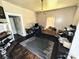 View of living room with a desk, dresser, rug, and natural light through window at 211 Oak Dr, Shelby, NC 28150