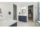 Bathroom features double vanity, walk in closet, toilet room, and lots of storage at 21319 Baltic Dr, Cornelius, NC 28031