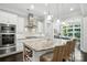 Gourmet kitchen boasts stainless appliances, a large island, and sleek modern design at 21319 Baltic Dr, Cornelius, NC 28031