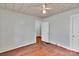 A bedroom with hardwood floors and neutral walls at 226 S Morrow Ave, Albemarle, NC 28001