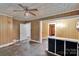 Dining area featuring vintage fixtures and wood paneling at 226 S Morrow Ave, Albemarle, NC 28001