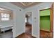 A hallway connecting a bathroom, bedroom, and closet at 226 S Morrow Ave, Albemarle, NC 28001