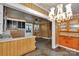 Cozy kitchen featuring wood-paneled walls and vintage fixtures at 226 S Morrow Ave, Albemarle, NC 28001