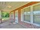A porch of a red brick home at 226 S Morrow Ave, Albemarle, NC 28001