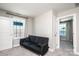 Bedroom with comfortable seating, a view to the outside, and ensuite access at 2526 Snow Creek Ne Rd, Hickory, NC 28601