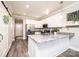 Open kitchen with granite countertops, stainless steel appliances, and white cabinetry at 2526 Snow Creek Ne Rd, Hickory, NC 28601