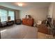 This flex room features a large window, convertible bed and desk, perfect for guests at 284 Old Harbor Dr, Mount Gilead, NC 27306