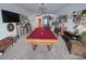 Spacious game room featuring a pool table, wet bar, and TV at 284 Old Harbor Dr, Mount Gilead, NC 27306