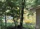 Natural landscape view featuring a pond with plenty of trees at 284 Old Harbor Dr, Mount Gilead, NC 27306