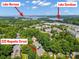 Panoramic aerial view of the neighborhood with lush trees, Lake Norman and Lake Davidson views at 320 Magnolia St, Davidson, NC 28036