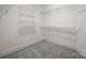 Walk-in closet with adjustable shelving at 320 Magnolia St, Davidson, NC 28036