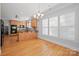 Bright kitchen with hardwood floors, an island, and stainless steel appliances at 320 Magnolia St, Davidson, NC 28036