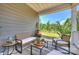 Charming back porch with outdoor seating, creating a relaxing space to enjoy the surrounding natural beauty at 336 Secretariat Dr, Iron Station, NC 28080