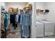Spacious walk-in closet with ample storage space and convenient laundry area at 336 Secretariat Dr, Iron Station, NC 28080