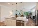 Open kitchen featuring granite countertops, stainless steel appliances, and seamless access to the dining and living areas at 336 Secretariat Dr, Iron Station, NC 28080