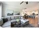 Spacious living room with a hardwood flooring, and an open layout flowing into the kitchen at 336 Secretariat Dr, Iron Station, NC 28080