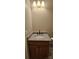 Bathroom featuring vanity with granite countertop and updated fixtures at 3549 Calpella Ct, Charlotte, NC 28262