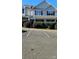 Charming townhouse with well-maintained landscaping and designated parking spaces at 3549 Calpella Ct, Charlotte, NC 28262