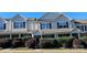 Attractive townhouse showcasing a welcoming facade and manicured front garden at 3549 Calpella Ct, Charlotte, NC 28262