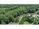 An aerial view of houses nestled among green trees at 431 Forest Dr, Maiden, NC 28650