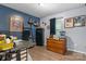 Home office space featuring a desk, drawers, shelves and decor with blue and gray paint at 431 Forest Dr, Maiden, NC 28650