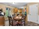 Cozy dining area adjacent to the kitchen, featuring a wooden table with seating for four people at 431 Forest Dr, Maiden, NC 28650