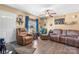 Comfortable living room with hardwood floors, a ceiling fan, a window, and warm, neutral paint at 431 Forest Dr, Maiden, NC 28650