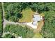 Aerial view showcases the home and meticulously landscaped grounds at 440 Bridlewood Dr, Gold Hill, NC 28071