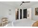 Bright bedroom with black doorframes, neutral walls, and a comfortable bed, leading to an ensuite bathroom at 440 Bridlewood Dr, Gold Hill, NC 28071