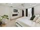 Cozy main bedroom featuring a modern fireplace, TV, and access to the en-suite bathroom at 440 Bridlewood Dr, Gold Hill, NC 28071