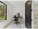 Small home office with sleek furniture and a window at 440 Bridlewood Dr, Gold Hill, NC 28071