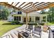 Outdoor space featuring pergola, dining, and view of the house at 440 Bridlewood Dr, Gold Hill, NC 28071