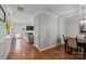 A welcoming hallway leading to the living room and dining area at 4408 Overbecks Ln, Waxhaw, NC 28173