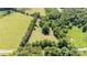 Aerial view of lush property, green trees and open fields, with a serene and natural setting at 495 Brumley Rd, Mooresville, NC 28115
