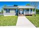 Charming single-story home with a covered porch, green siding, and black shutters at 50 Serenity Ln, Hickory, NC 28601