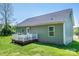 Well-maintained backyard with a deck and a view of the siding of the house at 50 Serenity Ln, Hickory, NC 28601