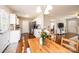 Charming kitchen with white cabinets, stainless steel appliances, and an adjacent dining area at 50 Serenity Ln, Hickory, NC 28601