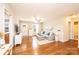 Open-concept living room featuring hardwood floors and natural light at 50 Serenity Ln, Hickory, NC 28601