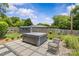 Backyard with a hot tub, shed, fenced yard and manicured landscaping at 5501 Murrayhill Rd, Charlotte, NC 28210