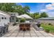 Outdoor patio with seating and built in grill, ideal for outdoor cooking and entertaining guests at 5501 Murrayhill Rd, Charlotte, NC 28210