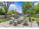 Backyard featuring a fire pit with comfortable seating, creating an inviting outdoor space at 5501 Murrayhill Rd, Charlotte, NC 28210