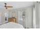 Bedroom featuring hardwood floors, a neutral color palette, and a light-filled ambiance at 5501 Murrayhill Rd, Charlotte, NC 28210