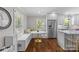 Cozy breakfast nook with built-in seating, a round table, and natural light at 5501 Murrayhill Rd, Charlotte, NC 28210