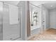 Bright bathroom with tub and shower combo, plus decor at 5822 Parkstone Dr, Matthews, NC 28104
