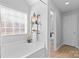 Bright bathroom with tub and shower combo, plus decor at 5822 Parkstone Dr, Matthews, NC 28104