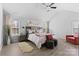 Bright main bedroom with vaulted ceiling, wood floors and lots of natural light at 5822 Parkstone Dr, Matthews, NC 28104