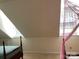 Comfortable attic bedroom with dormer windows and quaint decor at 6632 Summer Darby Ln, Charlotte, NC 28270