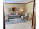 Inviting living room with a comfortable sofa and chairs, complete with a soft, neutral rug at 6632 Summer Darby Ln, Charlotte, NC 28270