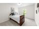 Well-lit bedroom with large windows and a comfortable bed at 6720 Long Nook Ln, Indian Trail, NC 28079
