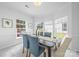 Inviting dining room with ample natural light, modern chandelier, and comfortable seating for Gathering gatherings at 6720 Long Nook Ln, Indian Trail, NC 28079